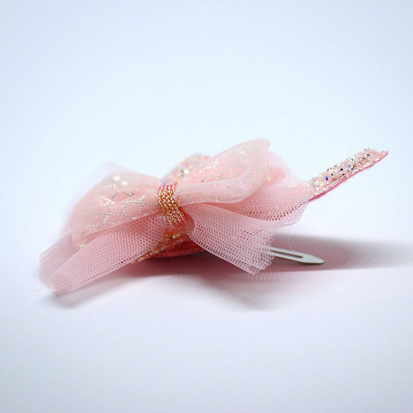 Glittery Rose Gold Bow Star Hair Clips